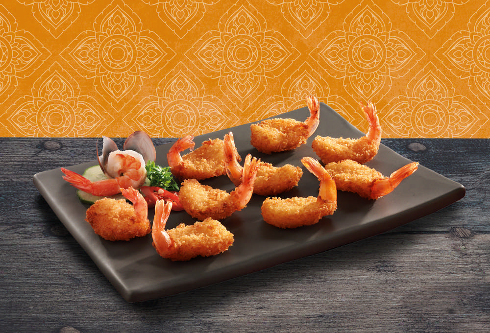 Butterfly crispy breaded shrimp with tail.